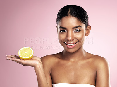 Buy stock photo Lemon fruit, skincare and portrait of happy woman in studio mockup, pink background and vitamin c benefits. Face of african model, citrus and natural beauty for cosmetics, vegan dermatology and shine
