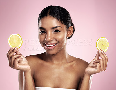 Buy stock photo Portrait of happy woman, lemon and skincare in studio, pink background or wellness of vitamin c benefits. Face of african model, citrus fruits and nutrition of beauty, organic cosmetics or detox diet