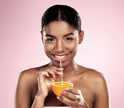 Buy stock photo Woman, drink and portrait with orange juice in studio for vitamin c benefits in skincare or dermatology. Citrus, fruit and smoothie for healthy nutrition, diet and natural beauty or organic cosmetics