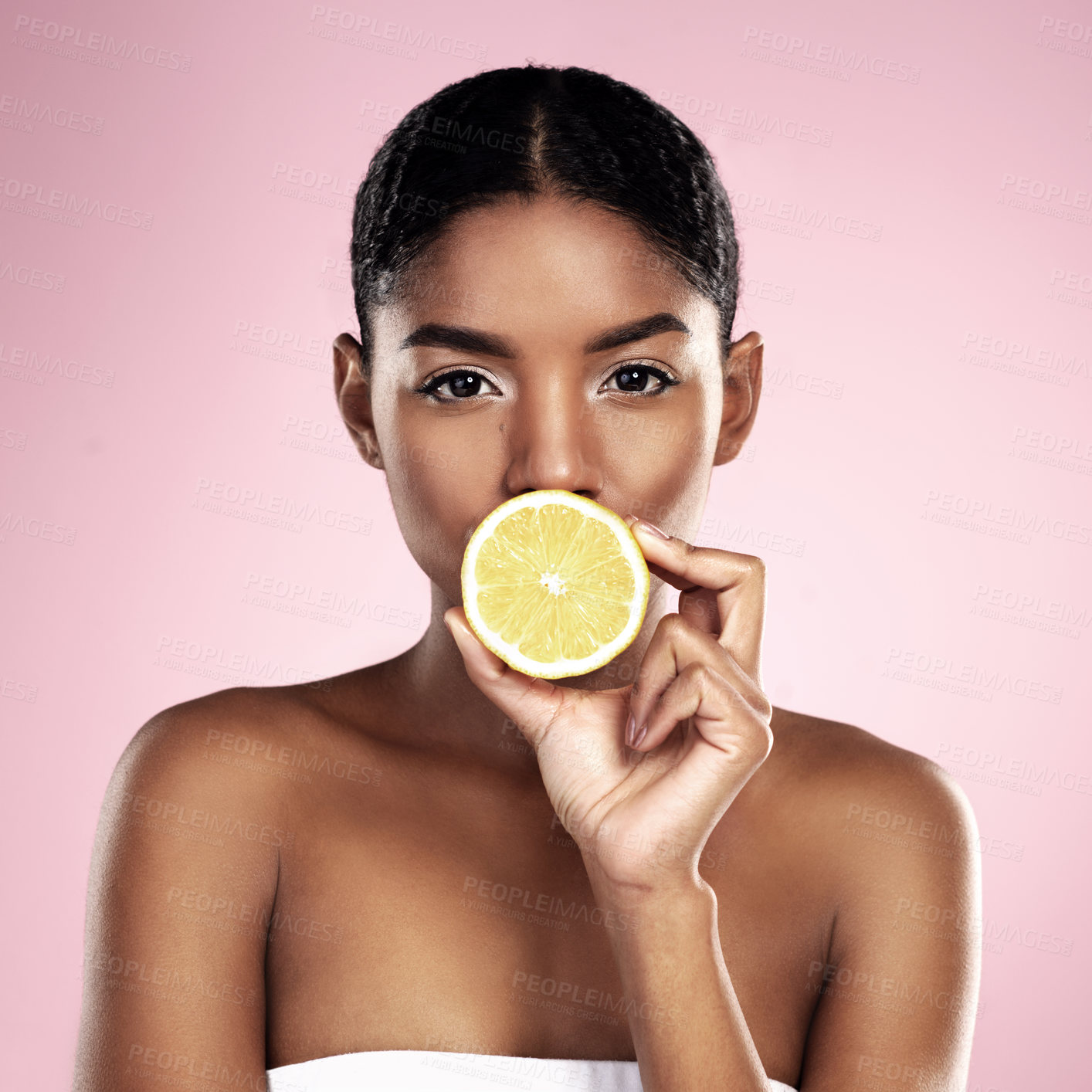 Buy stock photo Portrait, woman and lemon for beauty in studio, pink background and wellness of vitamin c cosmetics. Face of african model, citrus fruits and nutrition for skincare, organic benefits and natural diet