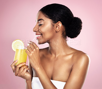 Buy stock photo Happy woman, healthy orange juice and glass in studio, pink background and detox for weight loss. African model, citrus smoothie and vitamin c fruits for vegan nutrition, diet drink or natural beauty