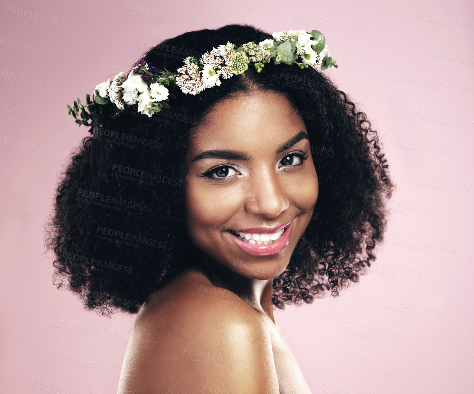 Buy stock photo Happy woman, portrait and flower crown for beauty in studio, pink background and natural skincare. Face of african model, floral wreath and plants for sustainable cosmetics, hair care and dermatology