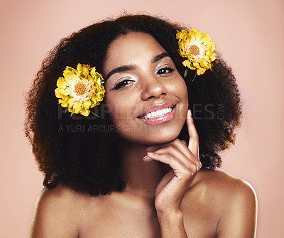 Buy stock photo Portrait face of happy woman, afro and flowers in studio background for beauty, floral aesthetic and shine. African model, natural skincare and daisy plants in hair for makeup, cosmetics and perfume