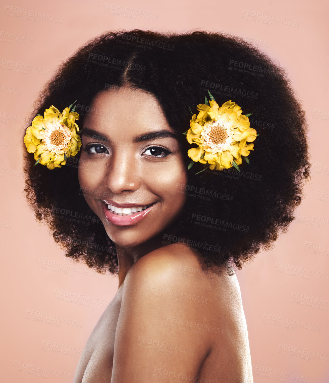 Buy stock photo Black woman, smile and portrait with flowers for natural beauty, freshness or afro haircare in studio. Female person, confident or skin care with yellow marigold for glow, growth or organic treatment