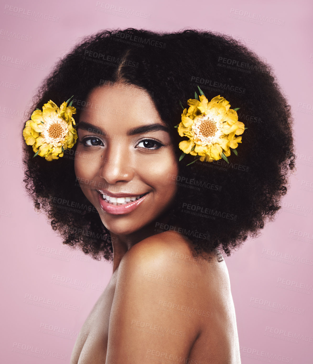 Buy stock photo African woman, portrait and flowers in studio for beauty, wellness and cosmetic on pink backdrop. Gen z female, plants and eco friendly salon treatment for sustainability and vegan haircare with glow