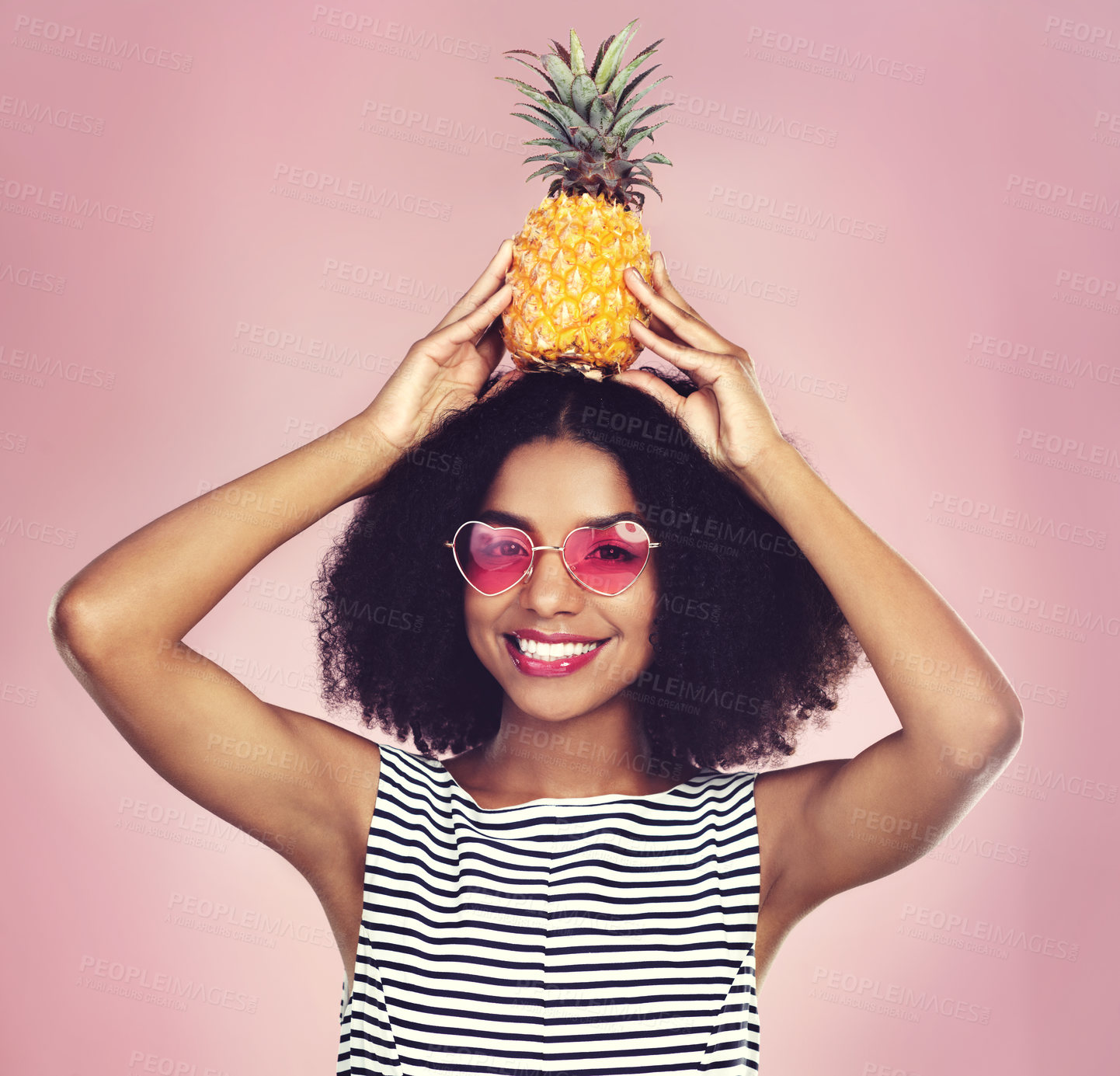 Buy stock photo Portrait, smile and woman with pineapple, glasses and fashion with confidence on pink studio background. Face, person and girl with fruit, nutrition and funky eyewear with happiness, joy and cheerful