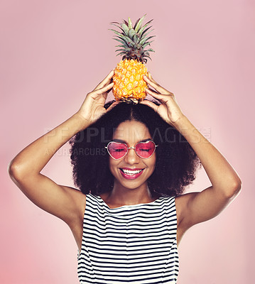 Buy stock photo Studio, smile and black woman with pineapple, detox and diet on pink background. Health, nutrition and gut digestion for weight loss and vitamins for female model, vegan and vitamin c for fiber