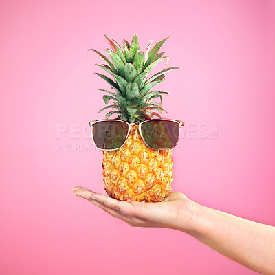 Buy stock photo Fruit, sunglasses and pineapple in hand of person on studio, pink background and mockup space. Party, food and offer cool snack in summer for nutrition, diet and wellness benefits from vitamin c