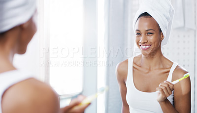 Buy stock photo Woman, mirror and brushing teeth in bathroom with smile or towel after shower for hygiene, cleaning or oral care. Female person, reflection and home for healthy mouth or tooth dental, gums or routine