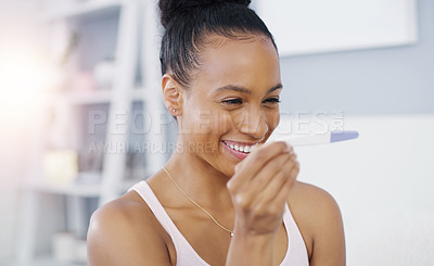 Buy stock photo Woman, pregnancy test and results smile in home for fertility journey or future mother, reading or ivf. Female person, stick and happiness good news or excited in apartment, ovulation or positive