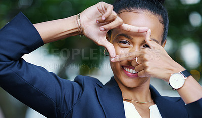 Buy stock photo Finger frame, portrait and cheerful business woman in city for photography, perspective or human resources. Bokeh, professional and face of female person with hand gesture, symbol or capture in Chile