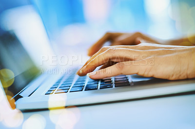 Buy stock photo Shot of an unrecognizable businesswoman typing on her laptop at her office desk at work