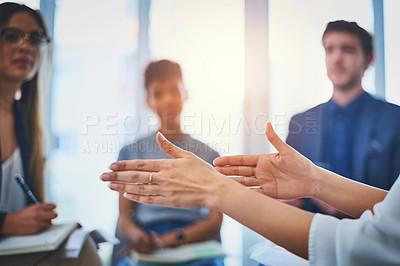 Buy stock photo Closeup shot of an unrecognzable businesswoman's hands gesturing during a meeting with her colleagues at work