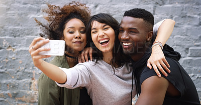 Buy stock photo Diversity, selfie and social media with friends on brick wall background in city for profile picture. App, happy or smile with man and woman group outdoor together for bonding, fun or photography