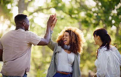 Buy stock photo Friends, happy and high five in park with celebration or connection, victory or together. Man, woman and diversity with laughing outdoor for funny joke or humor support in summer, relax or well done