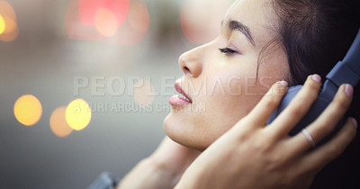 Buy stock photo Woman with headphones in city, peace and listening to music, freedom and technology outdoor. Mockup space, podcast or radio streaming with satisfied female person in urban street and audio playlist
