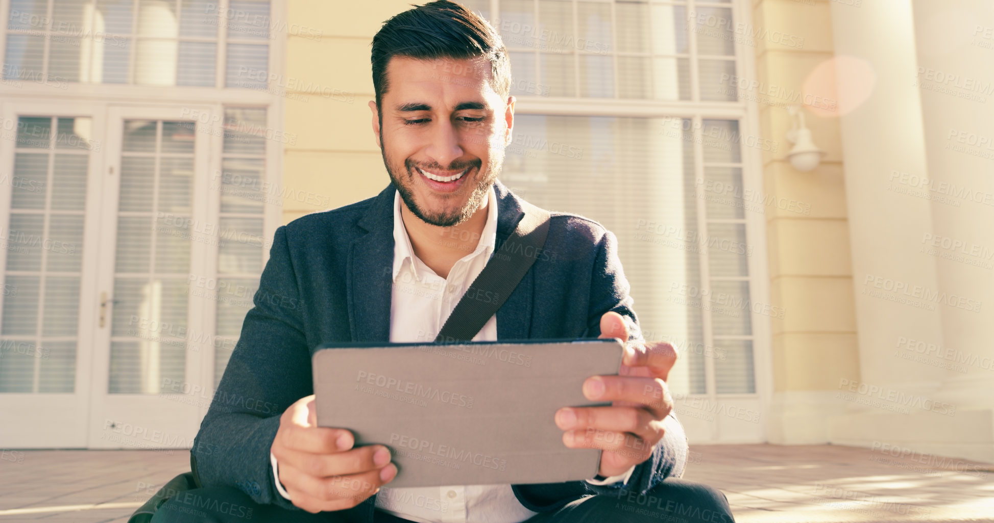 Buy stock photo Business man, tablet and reading in street with smile for notification, deal or email for story lead. Journalist, person and digital nomad on touchscreen for remote work, update or news on sidewalk 