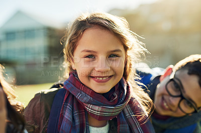 Buy stock photo Portrait, child and student on field at school for playground break, education scholarship and learning ambition. Smile, kids and kindergarten hug for study opportunity, development growth and proud