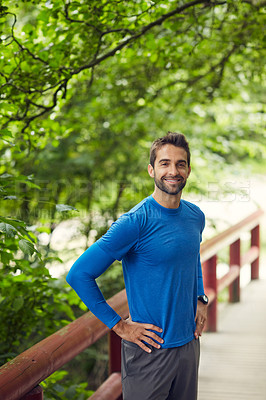 Buy stock photo Portrait of a sporty middle-aged man standing with his hands on his hips