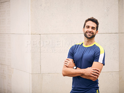 Buy stock photo Portrait of a sporty middle-aged man standing with his arms crossed