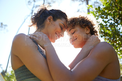 Buy stock photo Cropped shot of a sporty young couple spending the day outdoors