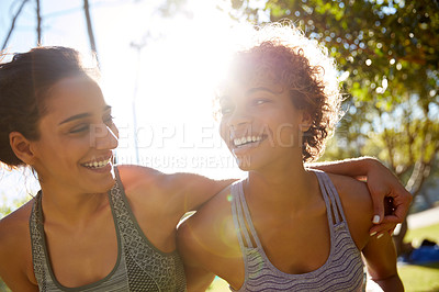 Buy stock photo Cropped shot of a sporty young couple spending the day outdoors