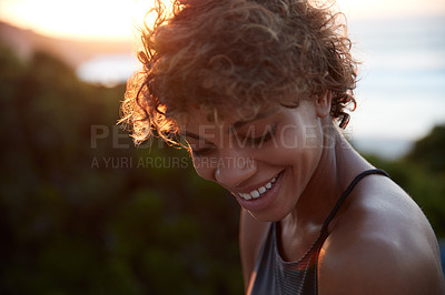 Buy stock photo Portrait of a beautiful young woman spending the day outdoors on a sunny day