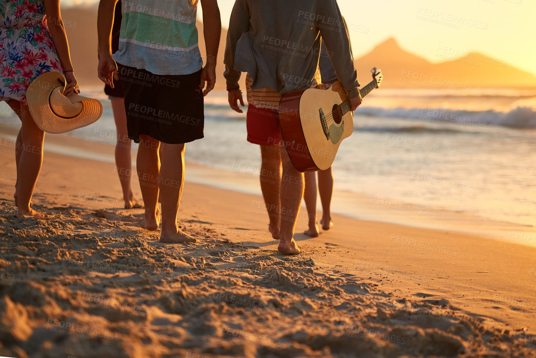 Buy stock photo Beach, legs and people with guitar, walking and closeup with vacation, travel and adventure. Friends, outdoor and group with summer holiday, string instrument and Bali with getaway trip and seaside