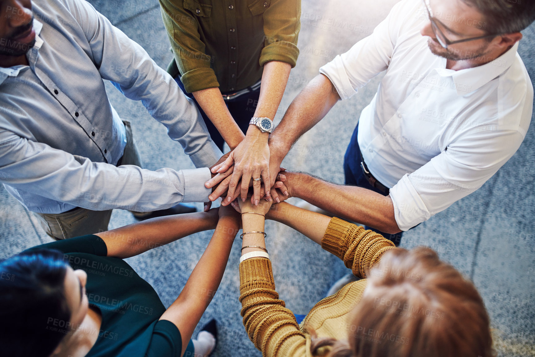 Buy stock photo Teamwork, hands in a huddle and working together with a team or group of business people and colleagues standing in the office. Togetherness, unity and motivation between creative coworkers at work