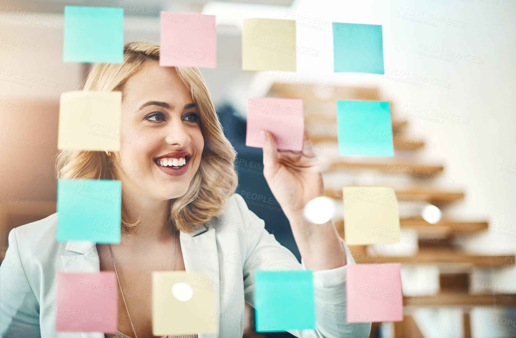 Buy stock photo Woman, smile and brainstorming with sticky note for timeline, goals and process of solution at glass window. Face of happy worker planning schedule, ideas and mindmap of vision, objectives and target