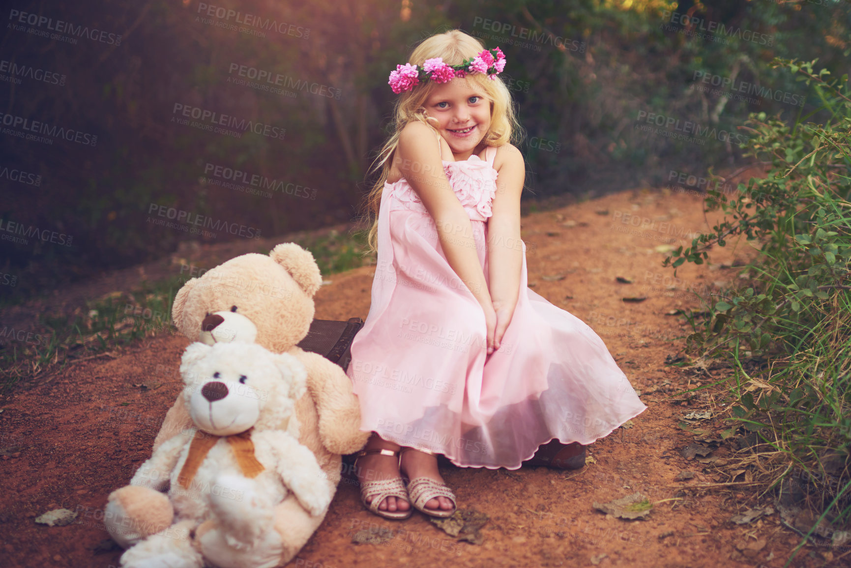 Buy stock photo Happy, flower crown and portrait of child with teddy bear in nature for fantasy, imagination or play time in forest. Smile, plush toy and girl kid from Germany with floral headband outdoor in woods.