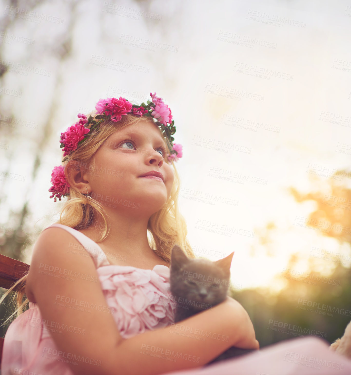Buy stock photo Girl, relax and thinking with kitten for love or furry companion for comfort, friendship and growth or development. Kid, flower crown and cute animal in nature with affection, bonding and playing.