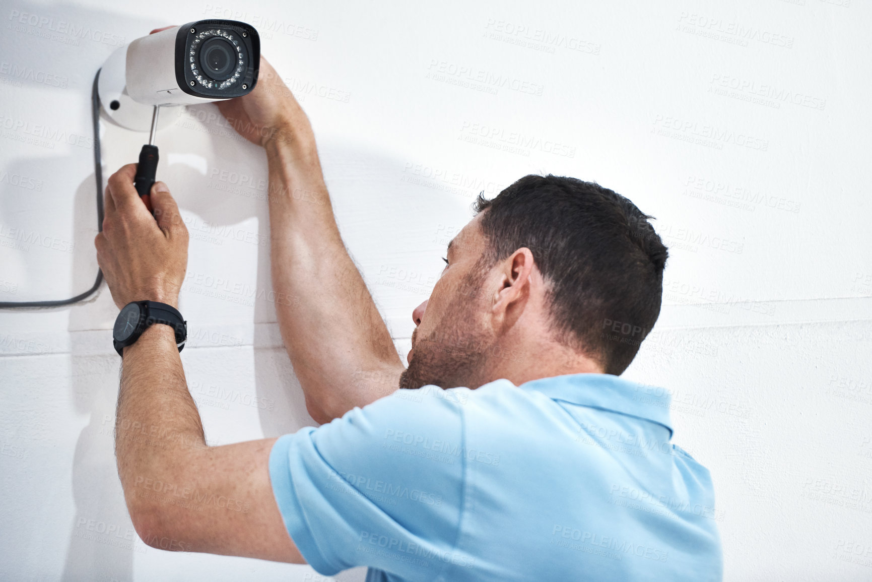 Buy stock photo Camera, surveillance and installation man or wall, protection and crime monitoring or criminal activity. Broadcasting, video and live feed for control room, movement detection and vigilance in office