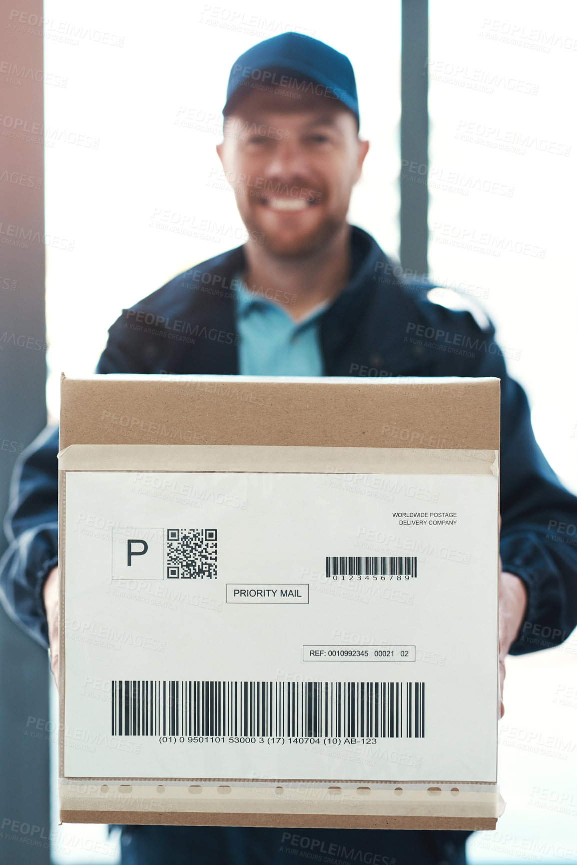 Buy stock photo Man, portrait smile and box for delivery for ecommerce, online shopping and product for shipping in building lobby. Logistics worker, guy and package for customer service, fast courier and safe cargo