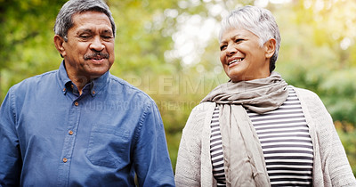 Buy stock photo Holding hands, walking and senior couple in park for bonding, commitment and loving relationship. Retirement, marriage and happy elderly man and woman relax together in nature for wellness and health