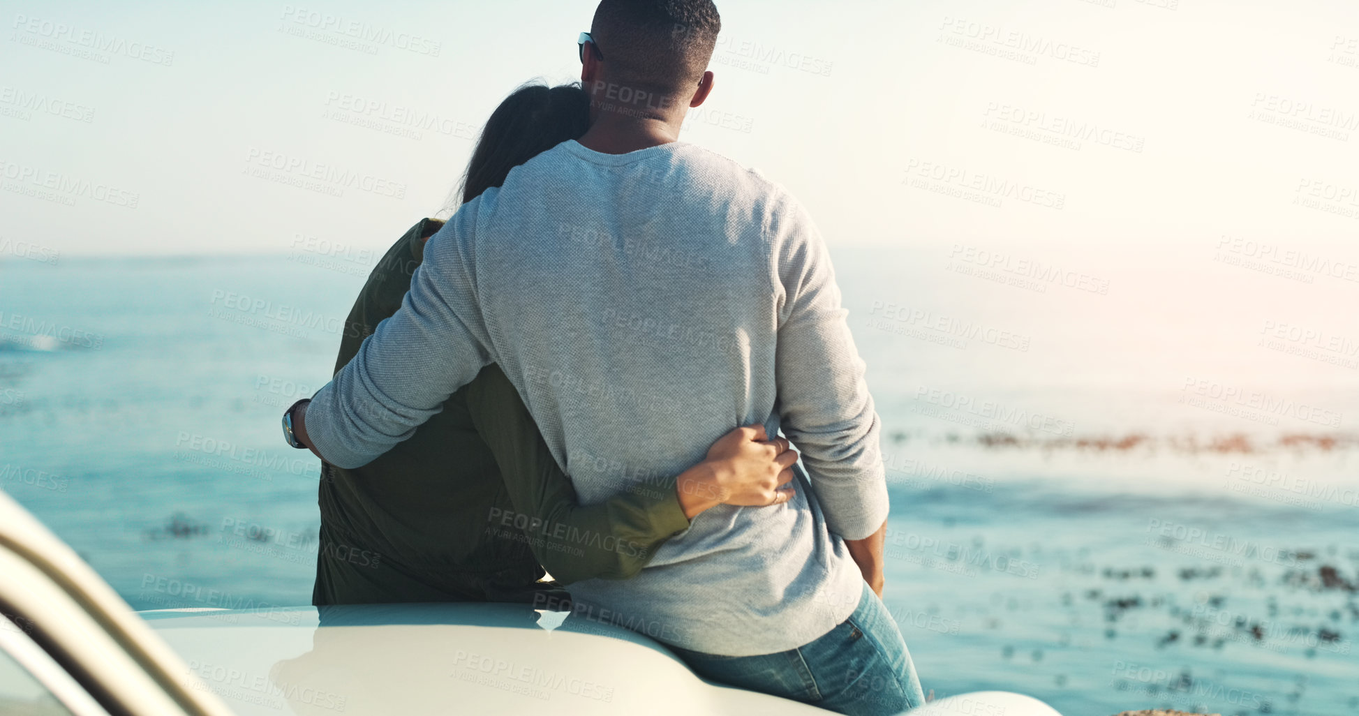 Buy stock photo Couple, back and ocean for view at beach, coastline date or anniversary with people on road trip for holiday. Sea, waves and relax outdoor with nature and environment for healthy relationship