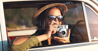 Buy stock photo Woman, photographer and car with camera for road trip, sunset or memory on outdoor journey in nature. Female person with hat and sunglasses for capture, picture or sightseeing on adventure or tour