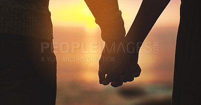 Buy stock photo Holding hands, couple and sunset sky at beach with love on vacation, holiday or adventure. Man and woman silhouette outdoor to celebrate marriage, commitment and ocean travel or date in nature