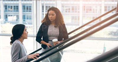 Buy stock photo Escalator, discussion and business women in office for arrival in lobby for work, job and career. Modern building, corporate team and people on electrical stairs talking, networking and conversation