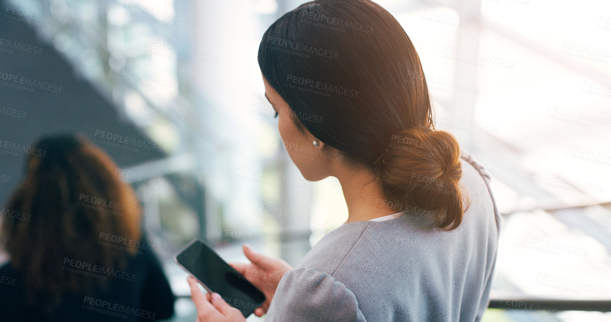 Buy stock photo Escalator, phone and business woman in office for arrival in lobby for work, job and career. Modern building, corporate worker and person on electrical stairs for social media, website and internet