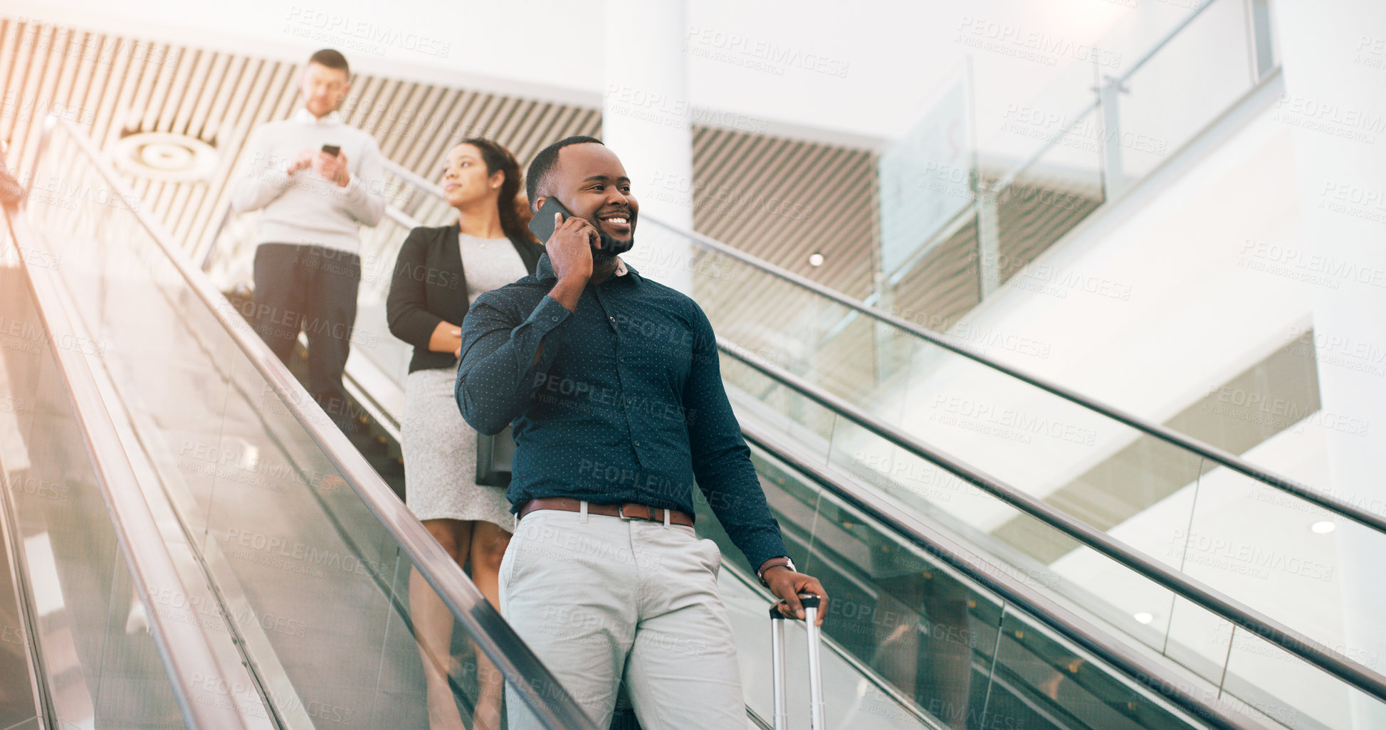 Buy stock photo Black man, escalator and talking with phone call for discussion or communication on work trip. Businessman speaking on mobile smartphone in travel with luggage for immigration or new opportunity