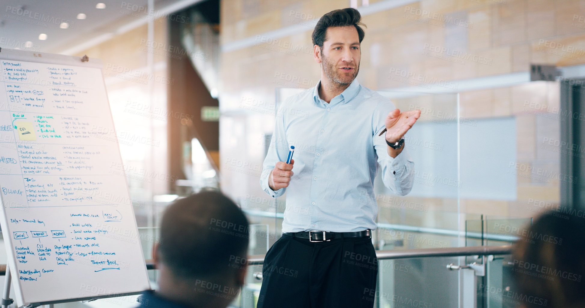 Buy stock photo Business man, speaker and board at conference, presentation or workshop with question, writing and talk. Leader, coach and mentor with whiteboard, training and advice for team in meeting room