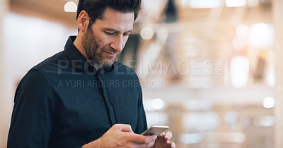 Buy stock photo Business man, texting and phone with space in office mockup for networking, chat and email communication. Businessman, smartphone and focus for schedule, notes and social network app in workplace