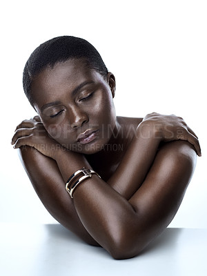 Buy stock photo Studio shot of a beautiful young woman striking a pose with her eyes closed  against a white background