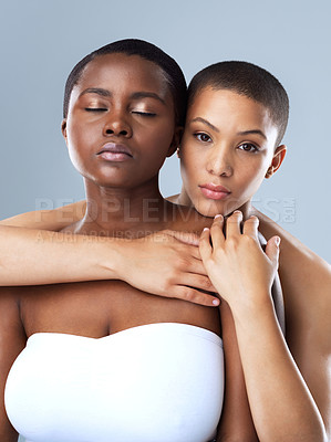 Buy stock photo Portrait, skincare and diversity of lesbian couple with beauty, glow and bald women embrace. Face, touch and girls together for inclusion, lgbtq and makeup for cosmetics isolated on studio background