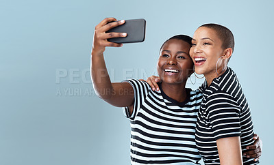 Buy stock photo Friends, happy and women with selfie in studio for social media, bonding or relationship with hug. Girl, smile and influencer with memory on gray background for post on mobile app or live streaming