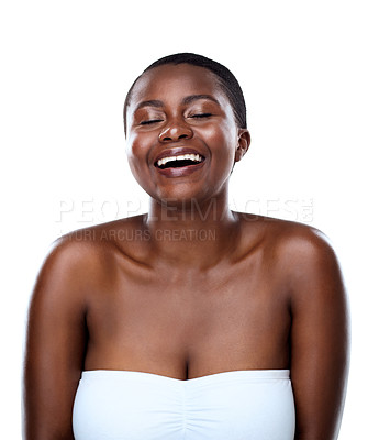 Buy stock photo Studio shot of a beautiful young woman striking a pose and laughing while standing against a white background