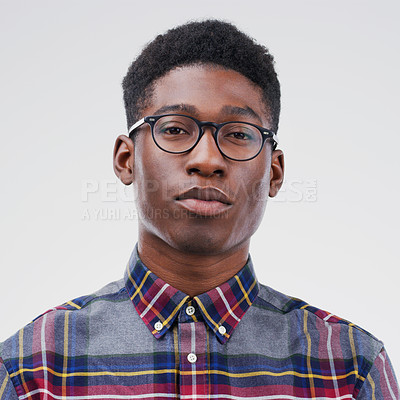 Buy stock photo Face portrait, serious nerd and black man in studio isolated on white background. African, geek and male person with glasses from South Africa with fashion, style and pose with clothes for confidence