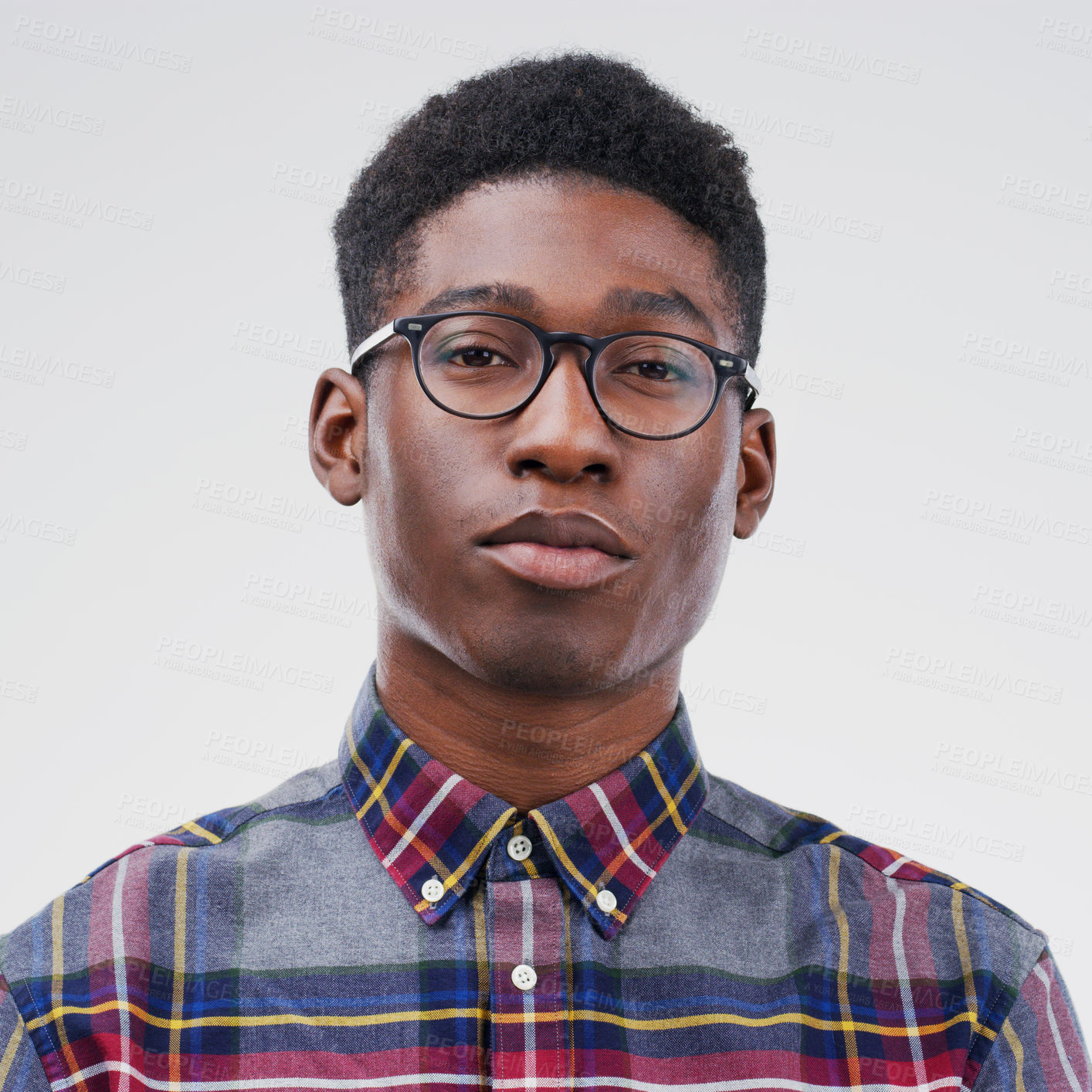 Buy stock photo Face portrait, serious nerd and black man in studio isolated on white background. African, geek and male person with glasses from South Africa with fashion, style and pose with clothes for confidence