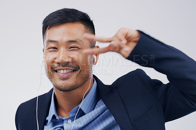 Buy stock photo Earphones, dance or businessman streaming music in studio for singing on grey background to relax. Chinese, podcast or happy Asian person listening to radio playlist, sound or song audio with smile